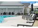 Relax and unwind by the community pool with comfortable lounge chairs and a serene setting at 527 Sunharvest Ln, Indian Trail, NC 28079