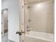 Modern bath and shower combo with clean design and contemporary finishes at 556 Billingsley Rd, Charlotte, NC 28211