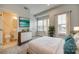 Bedroom with ensuite bath, bright windows, and ample natural light at 556 Billingsley Rd, Charlotte, NC 28211