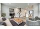 Open concept living room flows into kitchen, featuring modern furnishings and beautiful floors at 556 Billingsley Rd, Charlotte, NC 28211