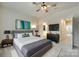 Main bedroom with contemporary design, ceiling fan and ensuite bathroom at 556 Billingsley Rd, Charlotte, NC 28211