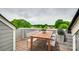 Rooftop deck area provides outdoor dining or entertaining space, and scenic neighborhood views at 556 Billingsley Rd, Charlotte, NC 28211