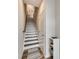 Entryway with a staircase and storage cabinet and a hardwood-look floor at 556 Billingsley Rd, Charlotte, NC 28211