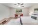 Spacious bedroom with natural light, wood floors, and minimalist design at 5564 N Hillsdale Dr, Fort Lawn, SC 29714