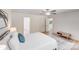 Cozy bedroom with natural light, wood floors, and white bedding at 5564 N Hillsdale Dr, Fort Lawn, SC 29714