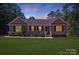 Charming single-story home featuring a well-manicured lawn and inviting front porch at 5564 N Hillsdale Dr, Fort Lawn, SC 29714
