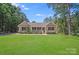 Charming single-story home with a well-maintained lawn, inviting porch, and mature trees at 5564 N Hillsdale Dr, Fort Lawn, SC 29714