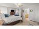 Elegant primary bedroom with connecting bathroom and a ceiling fan at 592 Shoreline Rd, New London, NC 28127