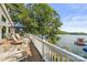 Expansive wooden deck overlooking the lake, perfect for outdoor enjoyment at 592 Shoreline Rd, New London, NC 28127