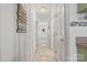 Hallway that offers ample storage, and has a door to the exterior, as well as access to the kitchen at 592 Shoreline Rd, New London, NC 28127