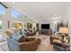 Inviting living room with lots of windows, natural light, comfortable seating, and a relaxed atmosphere at 592 Shoreline Rd, New London, NC 28127