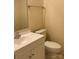 Bathroom features white fixtures and cabinet with a silver faucet and large mirror at 623 S New Hope Rd # 9, Gastonia, NC 28054