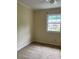Modest bedroom featuring plush carpeting and window with view of neighborhood at 623 S New Hope Rd # 9, Gastonia, NC 28054