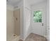 Bathroom with shower stall and entry door to outside at 6713 William Harry Ct, Charlotte, NC 28211