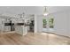 Bright, open kitchen with stainless steel appliances and hardwood floors at 6713 William Harry Ct, Charlotte, NC 28211