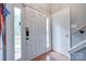 Bright home entryway featuring a secure digital lock, hardwood floors and access to the staircase at 679 Fairforest Rd, Chester, SC 29706