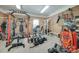 Home gym featuring an extensive weight rack system and cardio equipment at 679 Fairforest Rd, Chester, SC 29706