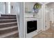Compact laundry room with stacked washer and dryer and built in storage at 679 Fairforest Rd, Chester, SC 29706