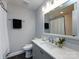 Updated bathroom features a stylish vanity, elegant fixtures, and modern design at 6922 Woodstock Dr, Charlotte, NC 28210
