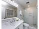 Stylish bathroom with a glass-enclosed shower, modern vanity, and elegant fixtures at 6922 Woodstock Dr, Charlotte, NC 28210