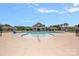 Community pool with a spacious deck, lifeguard stations, and a covered pavilion at 699 Kitfox Nw Dr, Concord, NC 28027