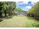 Backyard featuring a grass yard and home's exterior at 734 Club Dr, Statesville, NC 28677