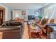 Cozy living room featuring hardwood floors, neutral paint, and comfortable seating at 734 Club Dr, Statesville, NC 28677