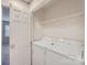 Bright utility area with modern white washer and dryer at 8221 Pineville Matthews Rd # G, Charlotte, NC 28226