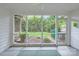 Charming screened-in porch with a view of the private backyard at 8221 Pineville Matthews Rd # G, Charlotte, NC 28226