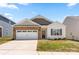 Charming single-Gathering home with a two-car garage, brick accents, and a well-manicured lawn at 9037 Remnick Dr, Gastonia, NC 28056