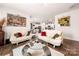 Bright living space with stylish furnishings, a glass table, and an open layout at 9037 Remnick Dr, Gastonia, NC 28056