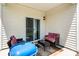 Covered patio with outdoor seating, a rug, and a blue grill at 9037 Remnick Dr, Gastonia, NC 28056
