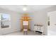 Bright bedroom featuring carpet flooring and a large window at 9311 St Barts Ln, Huntersville, NC 28078