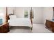 Cozy bedroom featuring a wood framed bed and carpet flooring at 9311 St Barts Ln, Huntersville, NC 28078