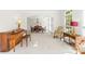 Elegant dining room with a chandelier, large windows, and carpet, perfect for hosting gatherings and Gathering meals at 9311 St Barts Ln, Huntersville, NC 28078