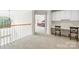 Upstairs hallway with built-in desk and view to the Primary bedroom at 9311 St Barts Ln, Huntersville, NC 28078