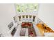Spacious living room with a fireplace, tall ceilings, and ample natural light at 9311 St Barts Ln, Huntersville, NC 28078