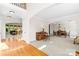 Open-concept living room showcasing hardwood floors and an archway to the formal dining area at 9311 St Barts Ln, Huntersville, NC 28078