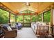 Comfortable screened in porch with wood ceiling and serene views at 9311 St Barts Ln, Huntersville, NC 28078