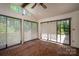 Bright sunroom with brick floors, vaulted ceiling, and multiple windows for natural light at 104 Ridge Dr, Stanley, NC 28164