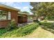 Charming brick home featuring a covered entryway, landscaping and a ramp at 1102 E 13Th St, Kannapolis, NC 28083
