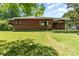 Traditional brick home with front yard and nice landscaping at 1102 E 13Th St, Kannapolis, NC 28083