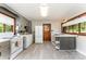 Functional kitchen with a laundry area, modern appliances, ample countertop space, and natural light at 1102 E 13Th St, Kannapolis, NC 28083