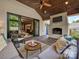 Relaxing outdoor patio with vaulted wood ceiling, fireplace and comfortable seating area at 1139 Yale Pl, Charlotte, NC 28209