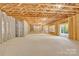 The unfinished basement features a walkout and is framed and ready to be transformed into the perfect space at 124 Starboard Ln, Statesville, NC 28677