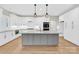 A well-appointed kitchen features granite countertops, stainless steel appliances, and ample cabinet space at 124 Starboard Ln, Statesville, NC 28677