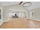 Open concept living room showcases the kitchen with an island and modern appliances, enhancing functionality at 124 Starboard Ln, Statesville, NC 28677