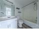 Clean bathroom features a vanity with storage and a shower and tub combo at 12749 Mosby Ln, Charlotte, NC 28273