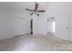 Bedroom with double closets and a ceiling fan at 12749 Mosby Ln, Charlotte, NC 28273