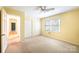 Bedroom with white trim, yellow walls, carpeted floor and double closet at 1285 10Th Street Nw Blvd, Hickory, NC 28601